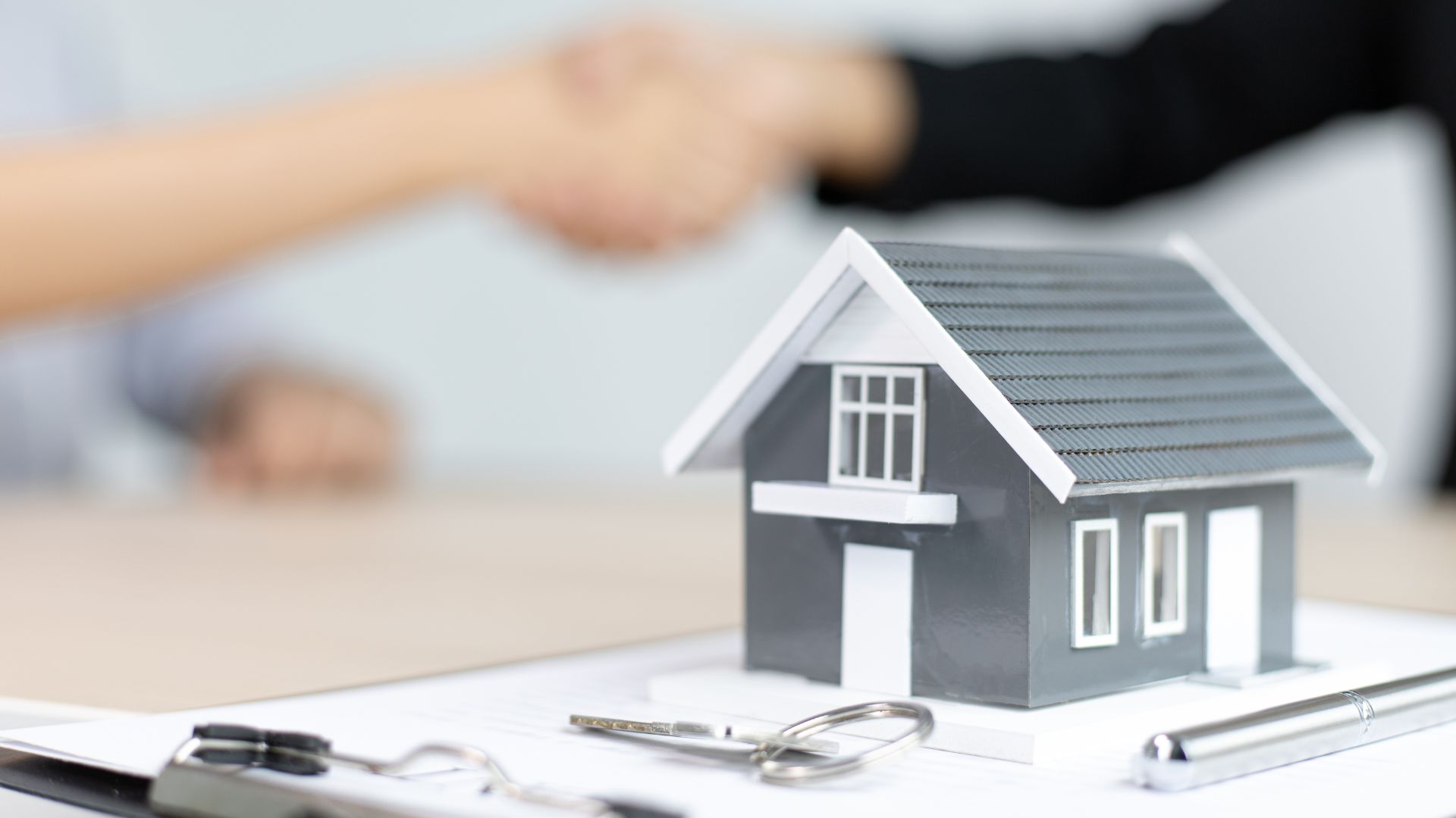 Real estate investment handshake